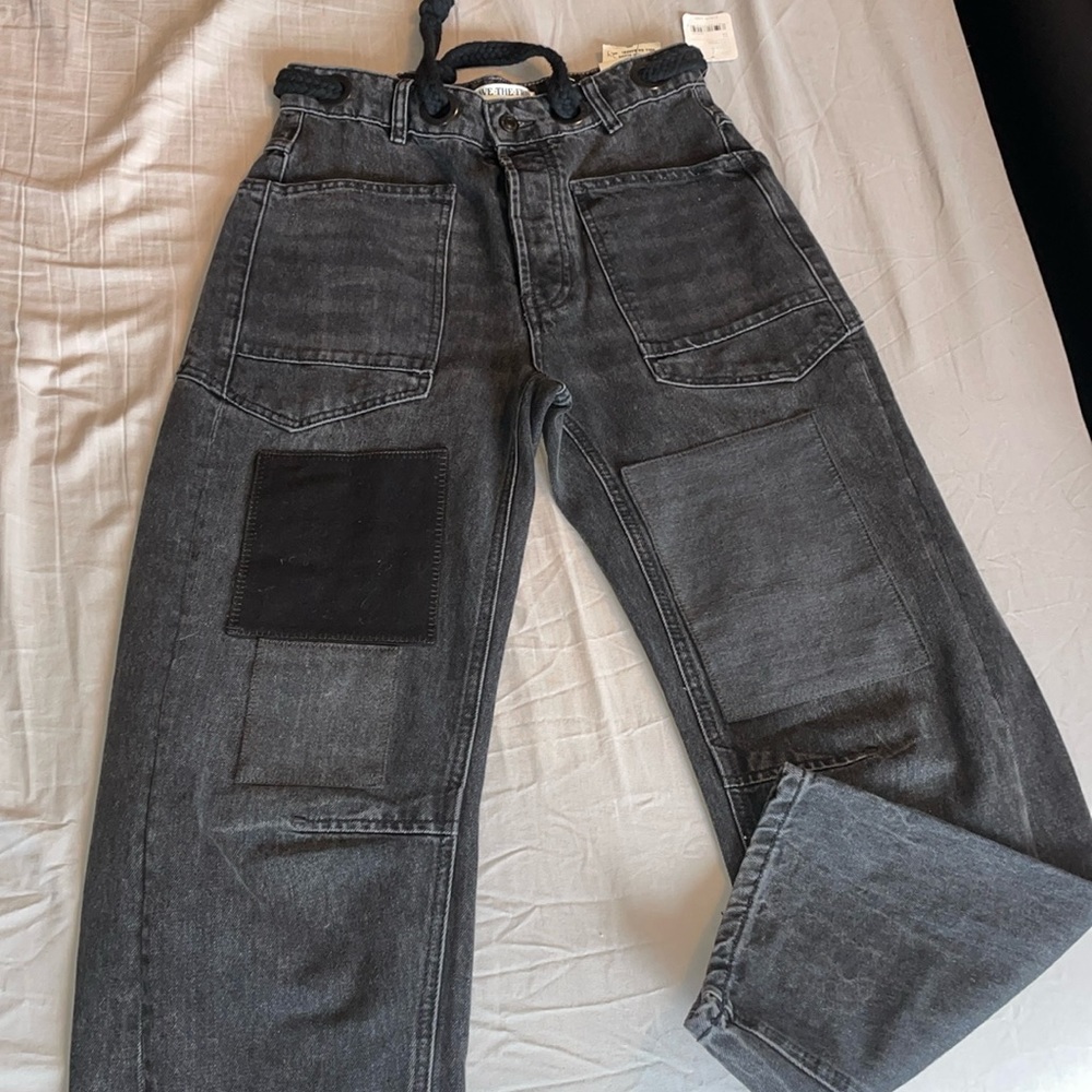 Free people black jeans with braided rope built in belt size 24